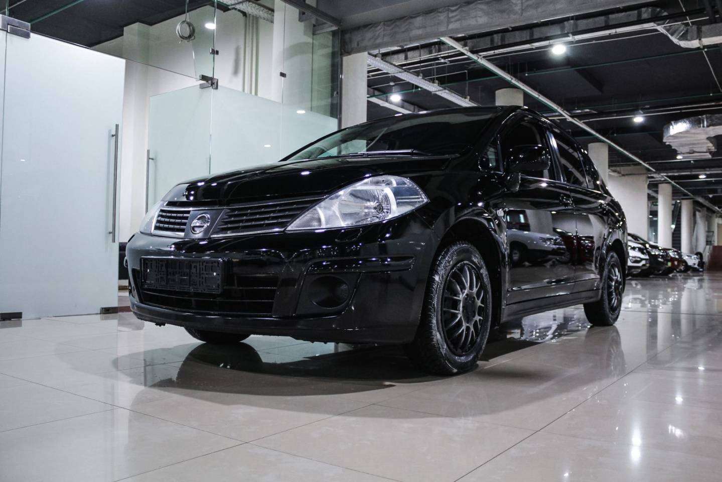 Купить Tiida с пробегом